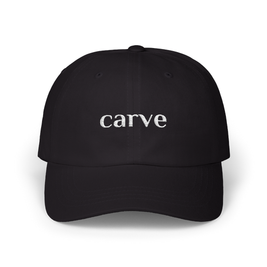 Black adjustable sports cap with white Carve Sports logo, breathable fabric, ideal for tennis and outdoor activities.