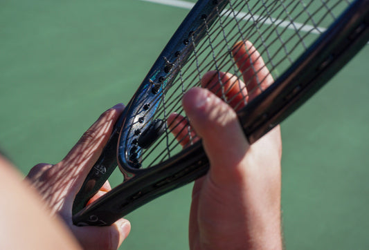 Adtouch tennis racket with strings