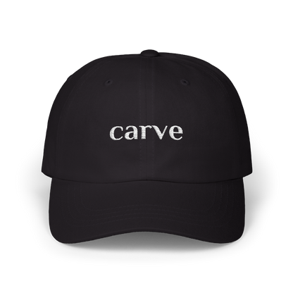 Black adjustable sports cap with white Carve Sports logo, breathable fabric, ideal for tennis and outdoor activities.